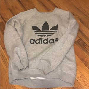 Gray Adidas sweatshirt.